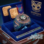 New Zealand Warriors 31st Anniversary 2026 Ring - top view with team banner in background